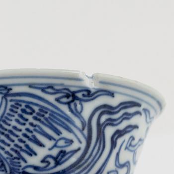 a pair of blue and white cups and three dishes, China, late Qing dynasty.