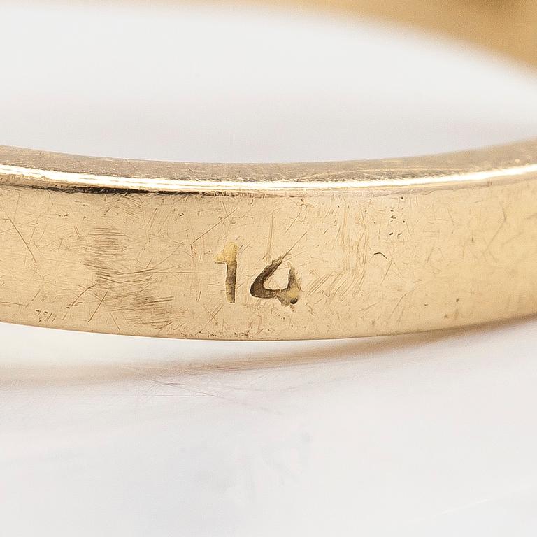 Ring, 14K guld med en diamant ca 0.23 ct och rubiner.