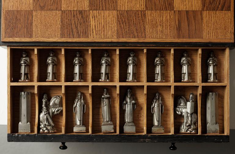A set of 32 Tore Strindberg chess pieces, executed by Herman Bergman foundry, Stockholm.