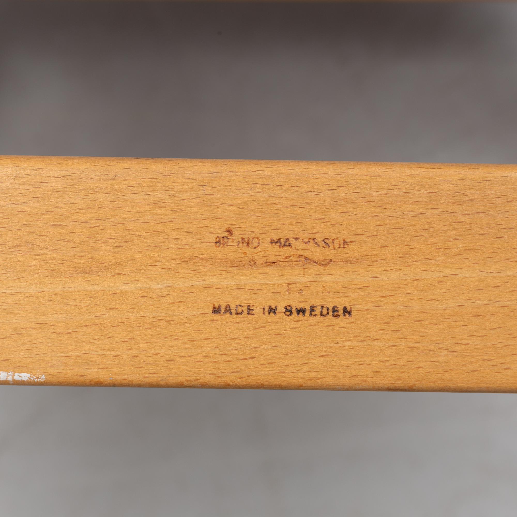 A pair of Bruno Mathsson 'Eva' lounge chairs, by Karl Mathsson, for VÄrnamo, 1965 and 1970.