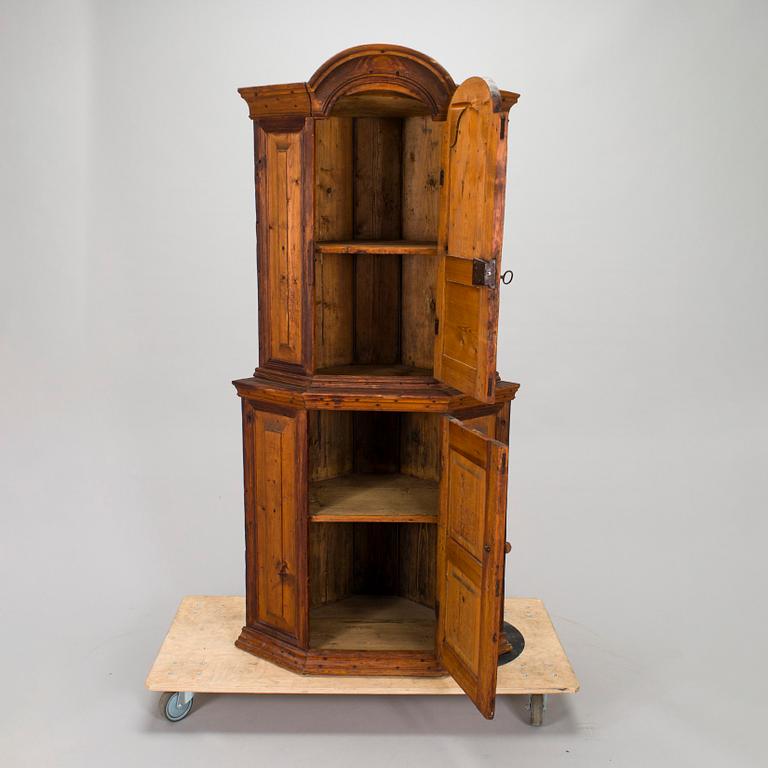 A 19th century Corner Cabinet.