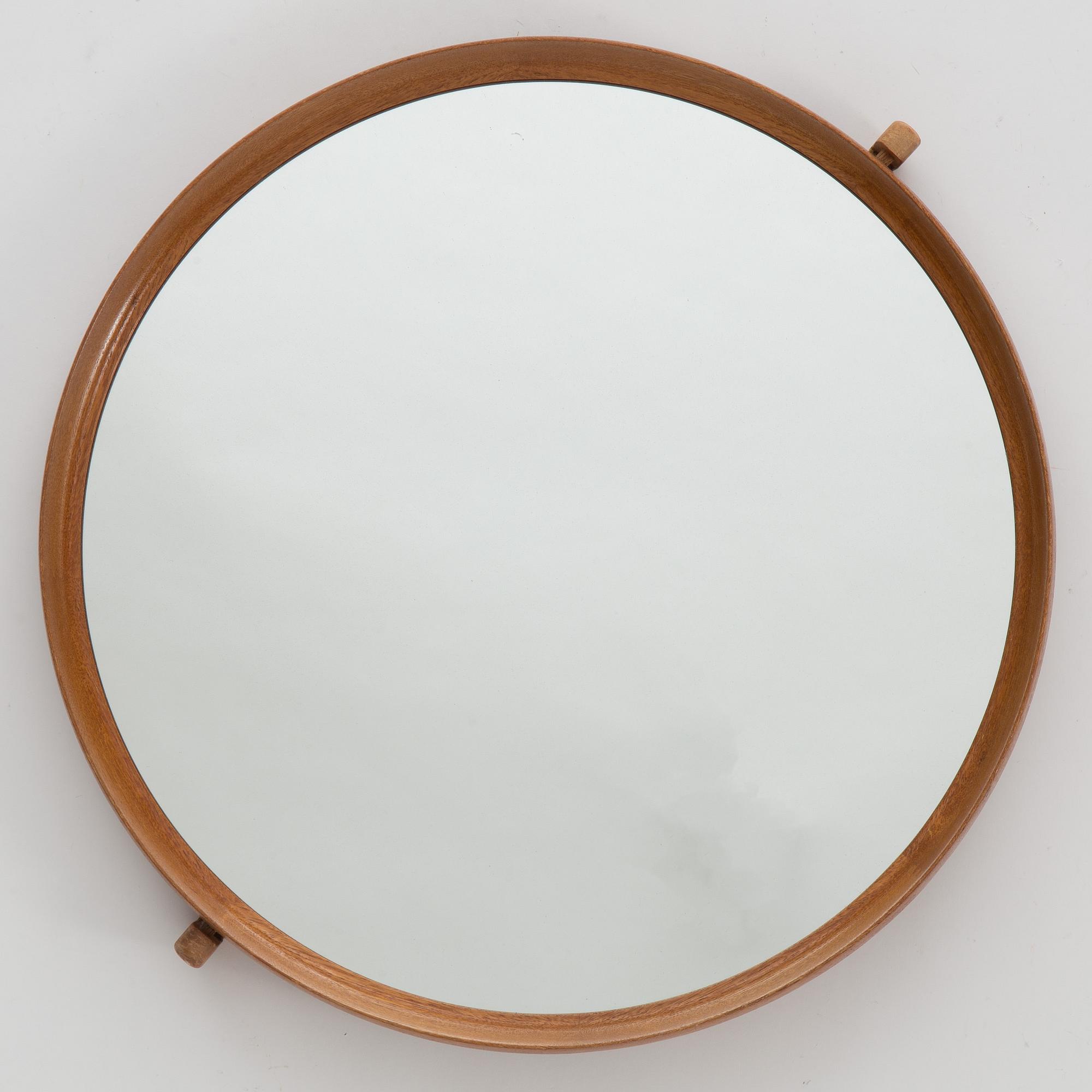 A mirror by Uno & Östen Kristiansson, Luxus, Vittsjö.