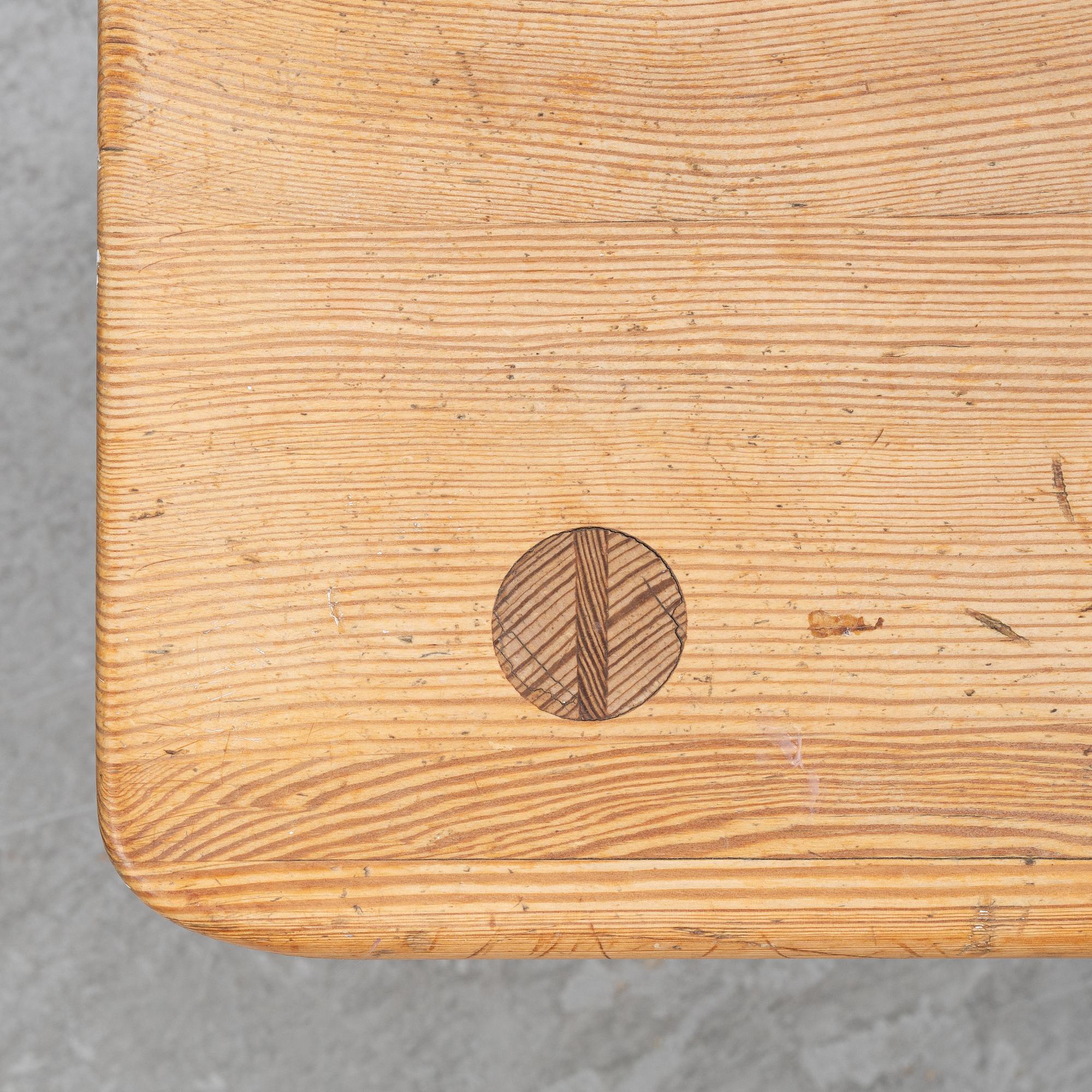 A pine stool by Carl Malmsten for Karl Andersson.