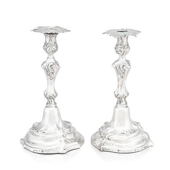 Two Swedish Rococo silver candlesticks, marks of Jakob Lampa, Stockholm 1764 and 1778.