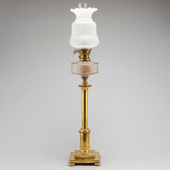 A brass oil lamp, late 19th Century.