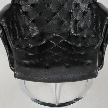 A "Jetson" chair, designed by 5Bruno Mathsson dfor Dux, made around year 2000.