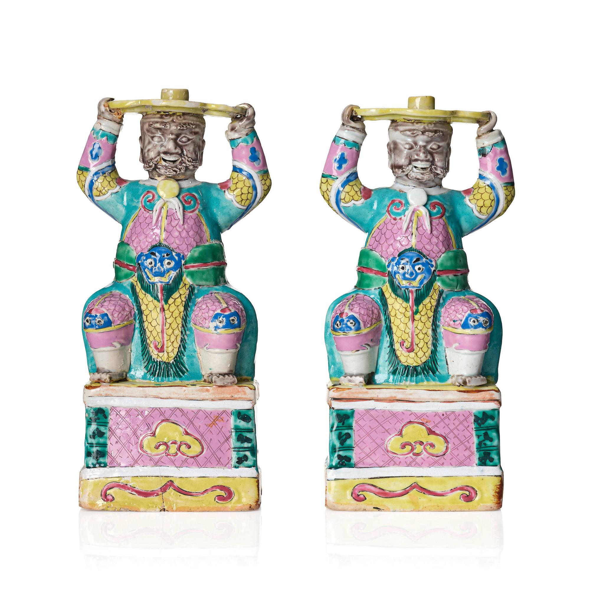 A pair of famille rose candlesticks, Qing dynasty, Qianlong (1736-95).
