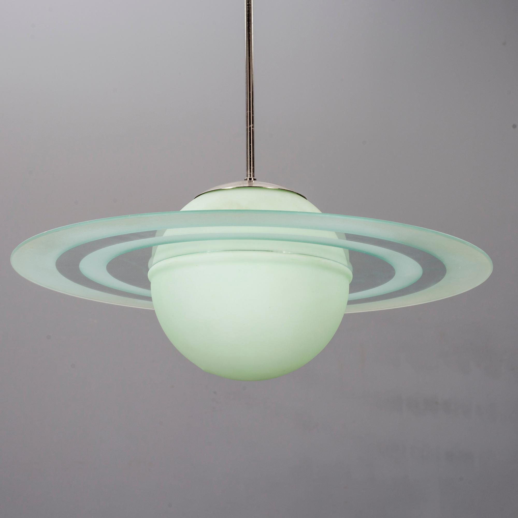 TAKLAMPA, "Saturnus", 1900-talets andra hälft.