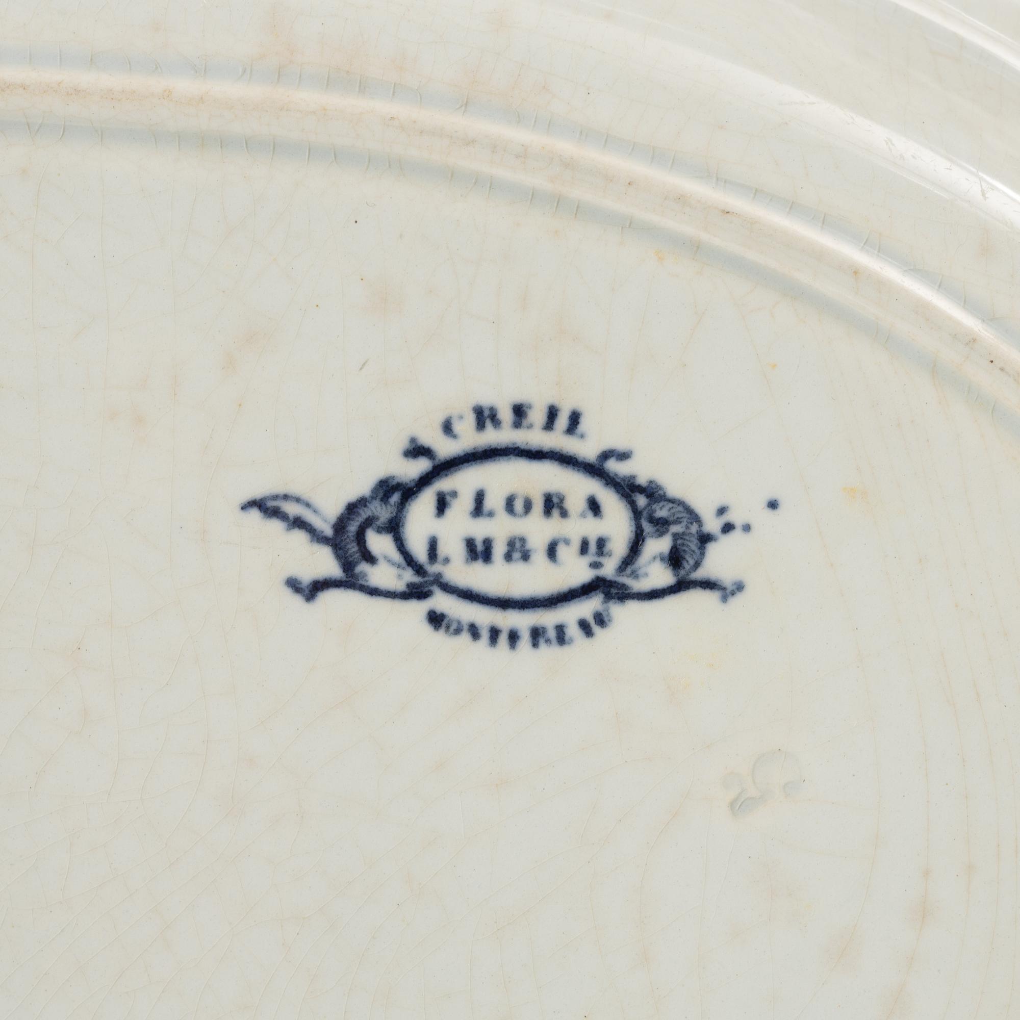 A 42 piece earthenware dinner service, 'Flora', Creil Montereau, France, late 19th Century.