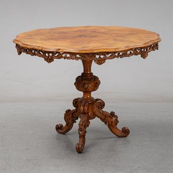 A rococo-style table from the second half of the 20th century.