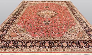 A part silk figural Tabriz carpet, so-called 50 Radj, c. 405 x 299 cm.