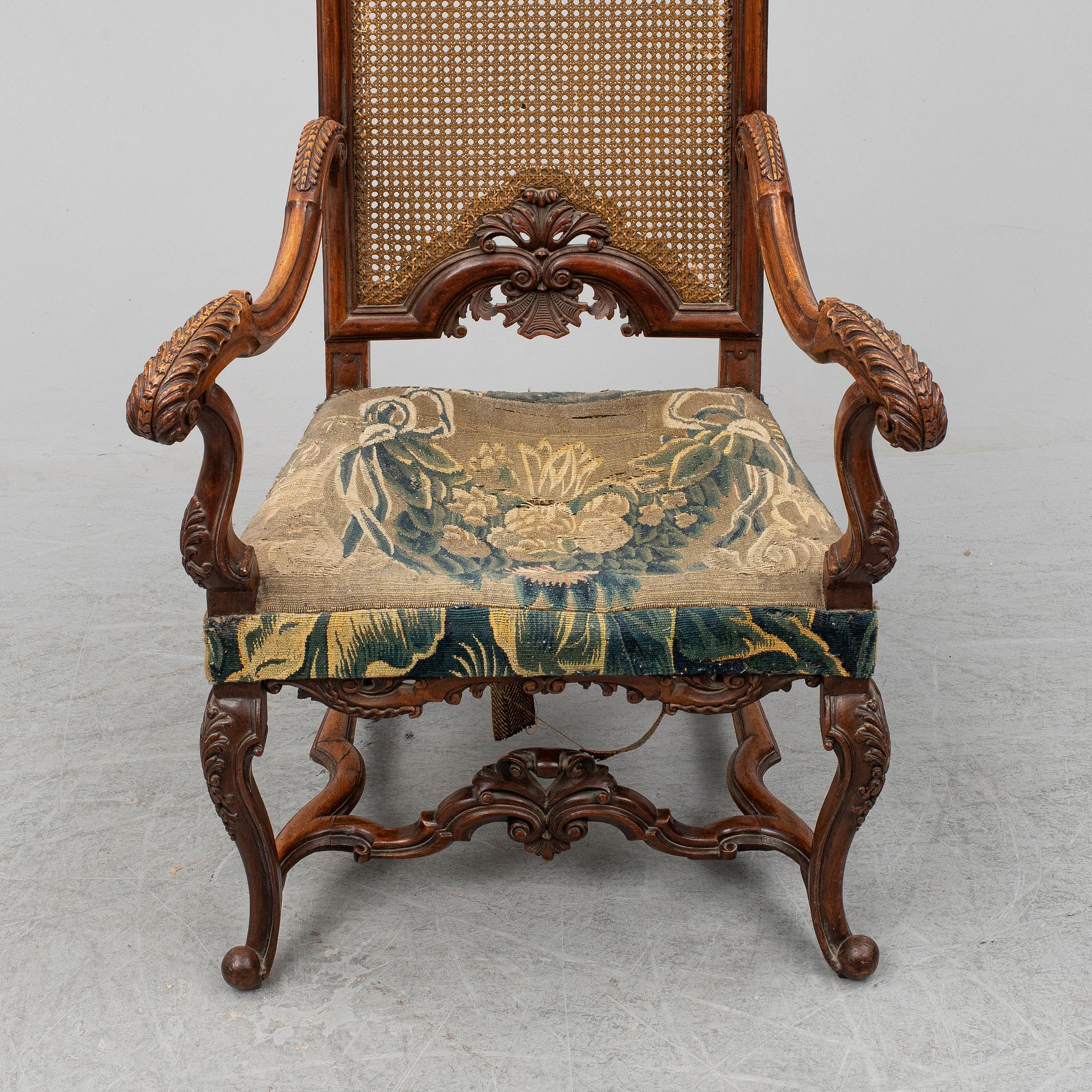 A 19th century baroque style armchair.