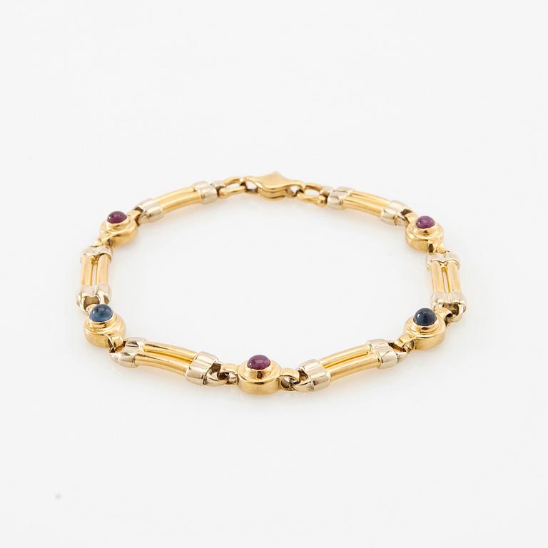 Bracelet 18K rose and white gold set with cabochon-cut sapphires and rubies, possibly Ancona Italy.