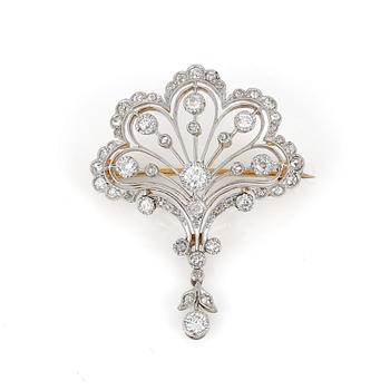 BROSCH, 14K guld samt troligen silver med olika slipade diamanter ca 0,84 ct första kvartal 1900-tal. Total vikt ca 6 g.