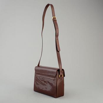 ESCADA, a brown leather handbag.