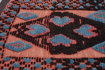 A carrige cushion, knotted pile in relief, ca 43,5 x 100 cm (with mounting 51 x 107,5 cm), southwestern Scania, Sweden.