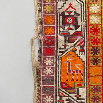 A rug presumably from Karabagh, around 1900. Ca. 305 x 137 cm.