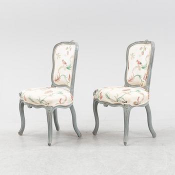 A painted  pair of rococo chairs, mid 18th Century.