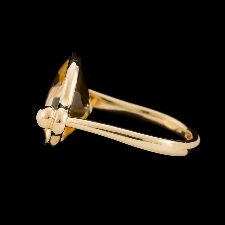 A 'Savannah' ring set with a faceted citrine by Vivianna Torun Bülow Hübe for Georg Jensen, designed 2006.