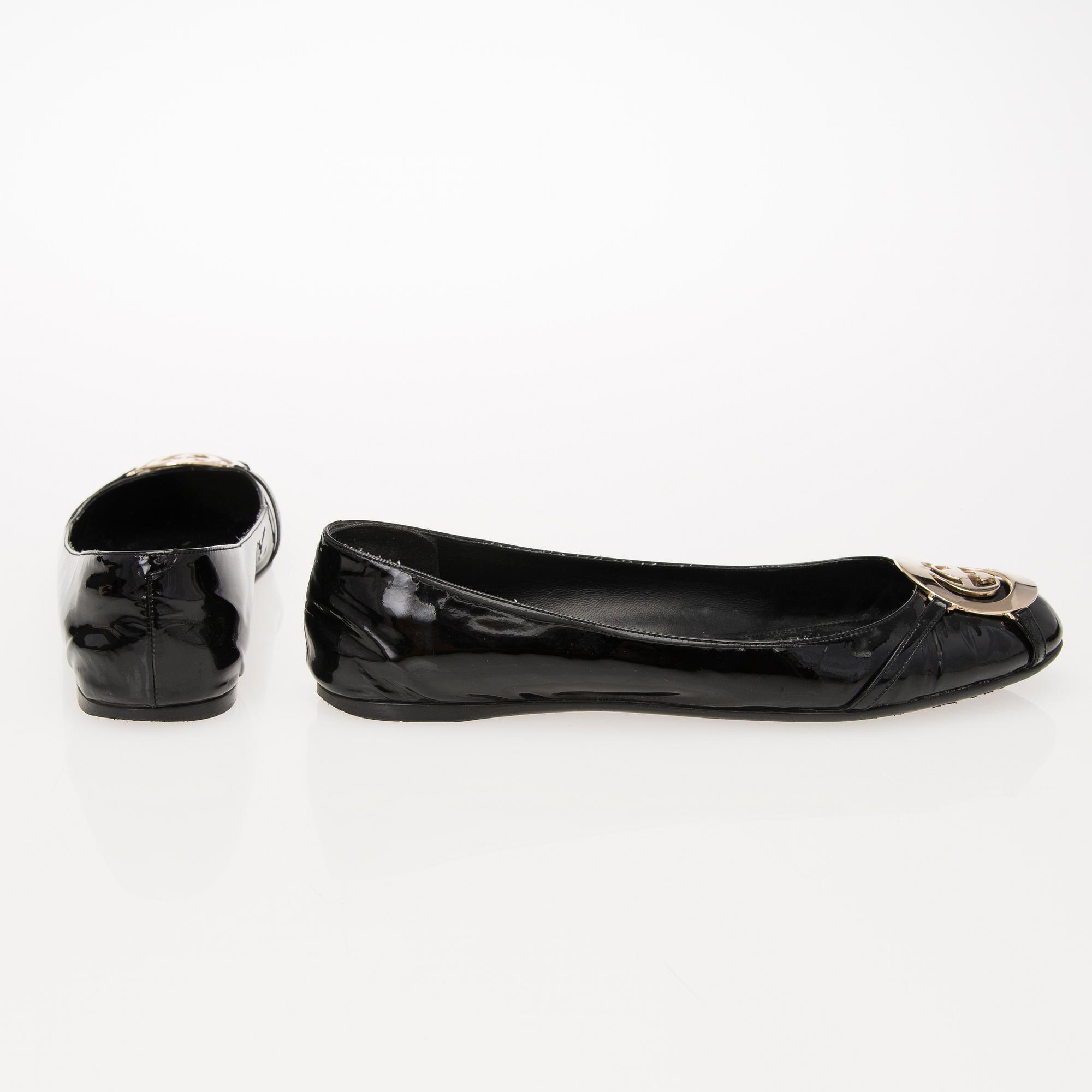 A Pair of Black Leather Ballerinas, size 40.