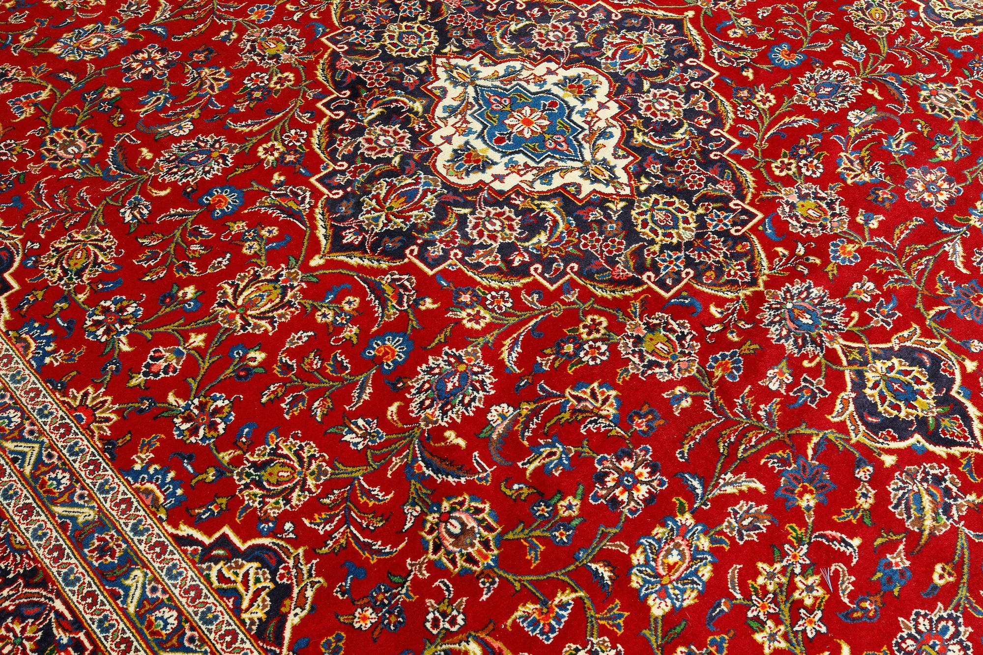 A Keshan carpet, 398 x 298 cm.