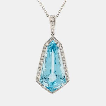 An 18K gold and aquamarine pendant set with round brilliant-cut diamonds.