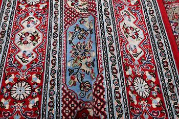 A Quum carpet, c. 250 x 150 cm.