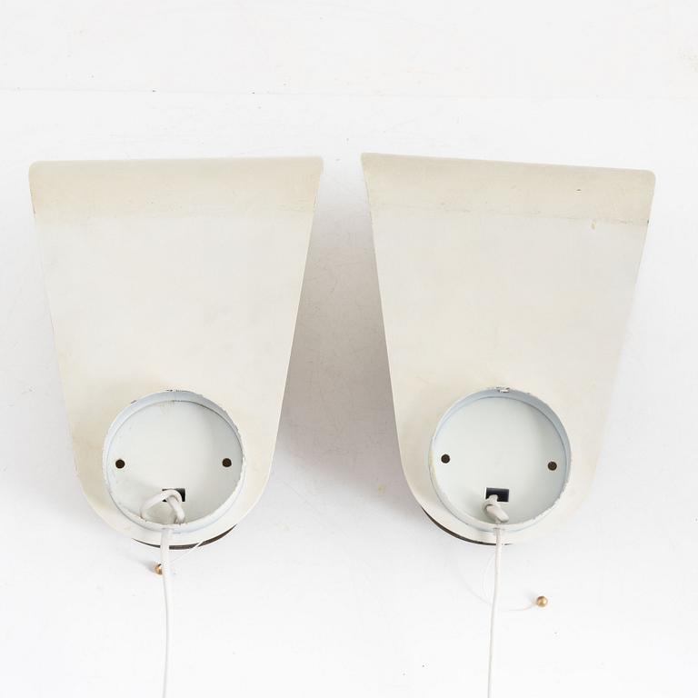 Harald Notini, a pair of model "8596" wall lamps, Arvid Böhlmarks Lampfabrik, Stockholm, 1940s-50s, 1940s-50s.