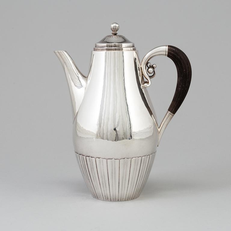 A silver coffee pot, designed by Johan Rodhe for Georg Jensen, Denmark, after 1945. Weight ca 647 grams.