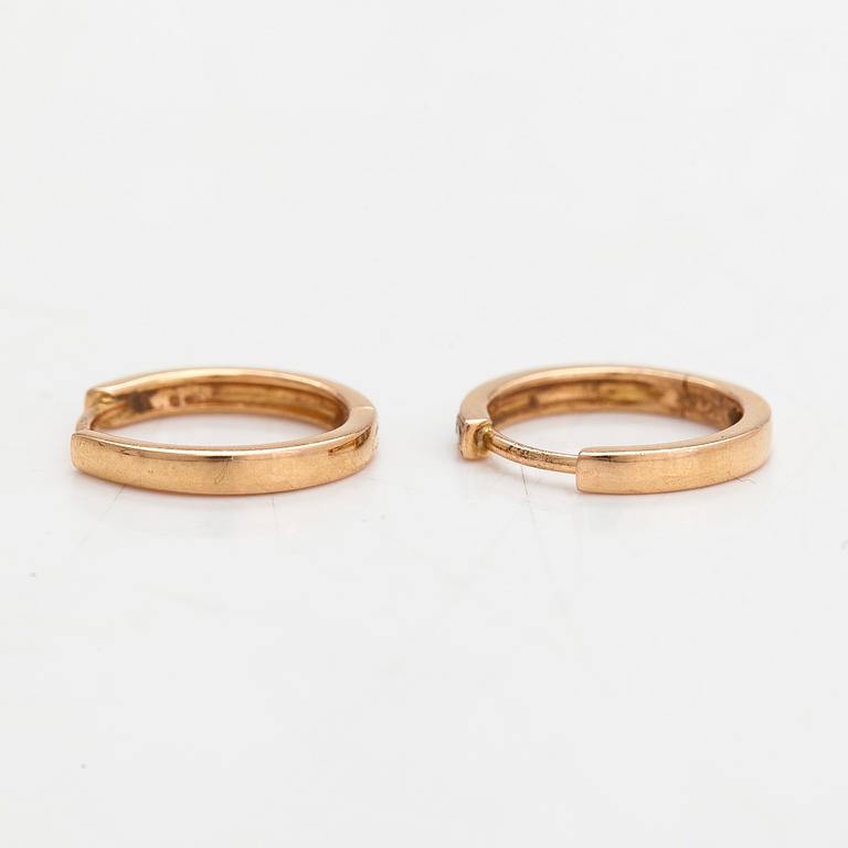Korvakorut, 18K kultaa, timantteja yht. n 0.22 ct.