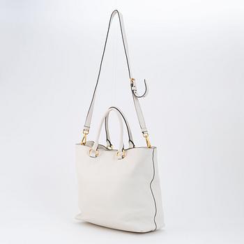 Prada, a white leather handbag.