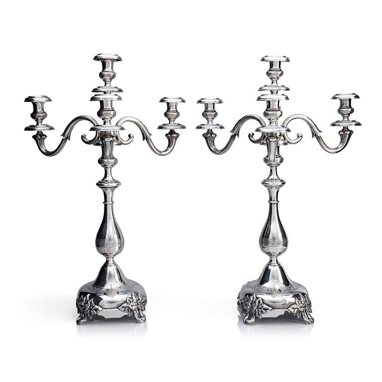 A pair of Swedish 19th century silver candelabra, marks of Gustaf Theodor Folcker, Stockholm 1871.