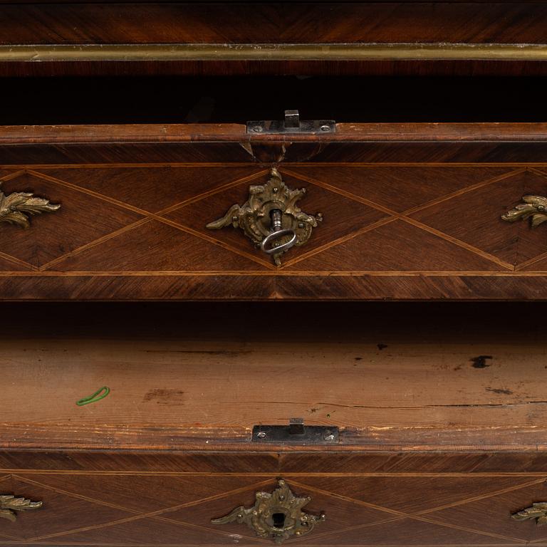 A rococo secretaire, second half of the 18th Century.