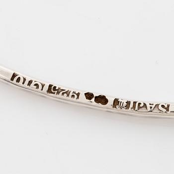 Annie Jägbeck silver necklace and earrings.