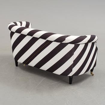 A black and white striped sofa by Rosenhof Art Factory, 21st century.
