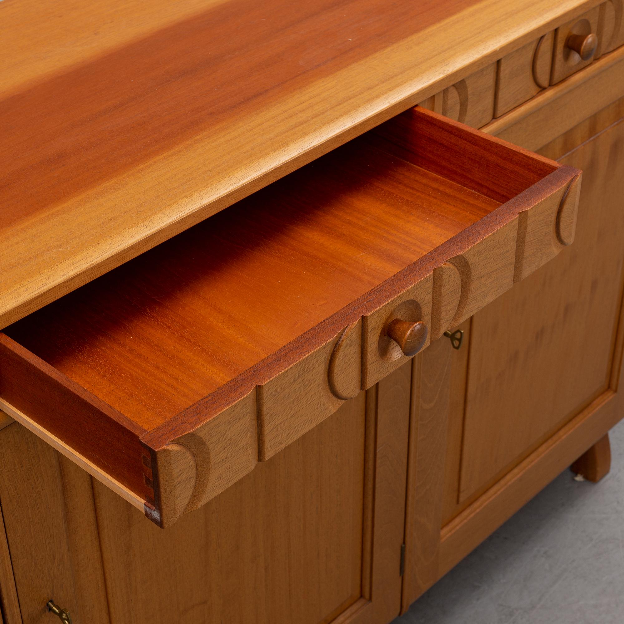 Carl Malmsten, a 'Calmare Nyckel' walnut sideboard.