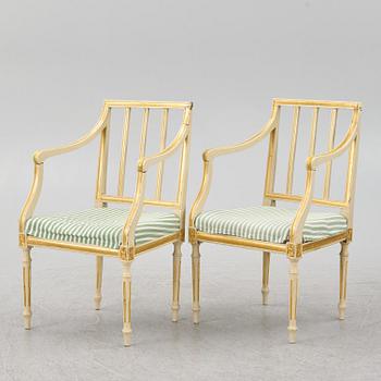 A pair of Gustavian style armchairs, 19th century.