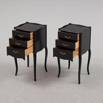 A pair of rococo style bedside tables, 20th century.