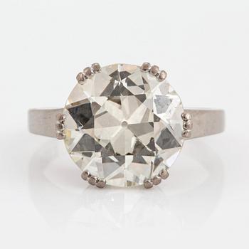 An 18K white gold ring set with an old-cut diamond 4.55 cts according to engraving.