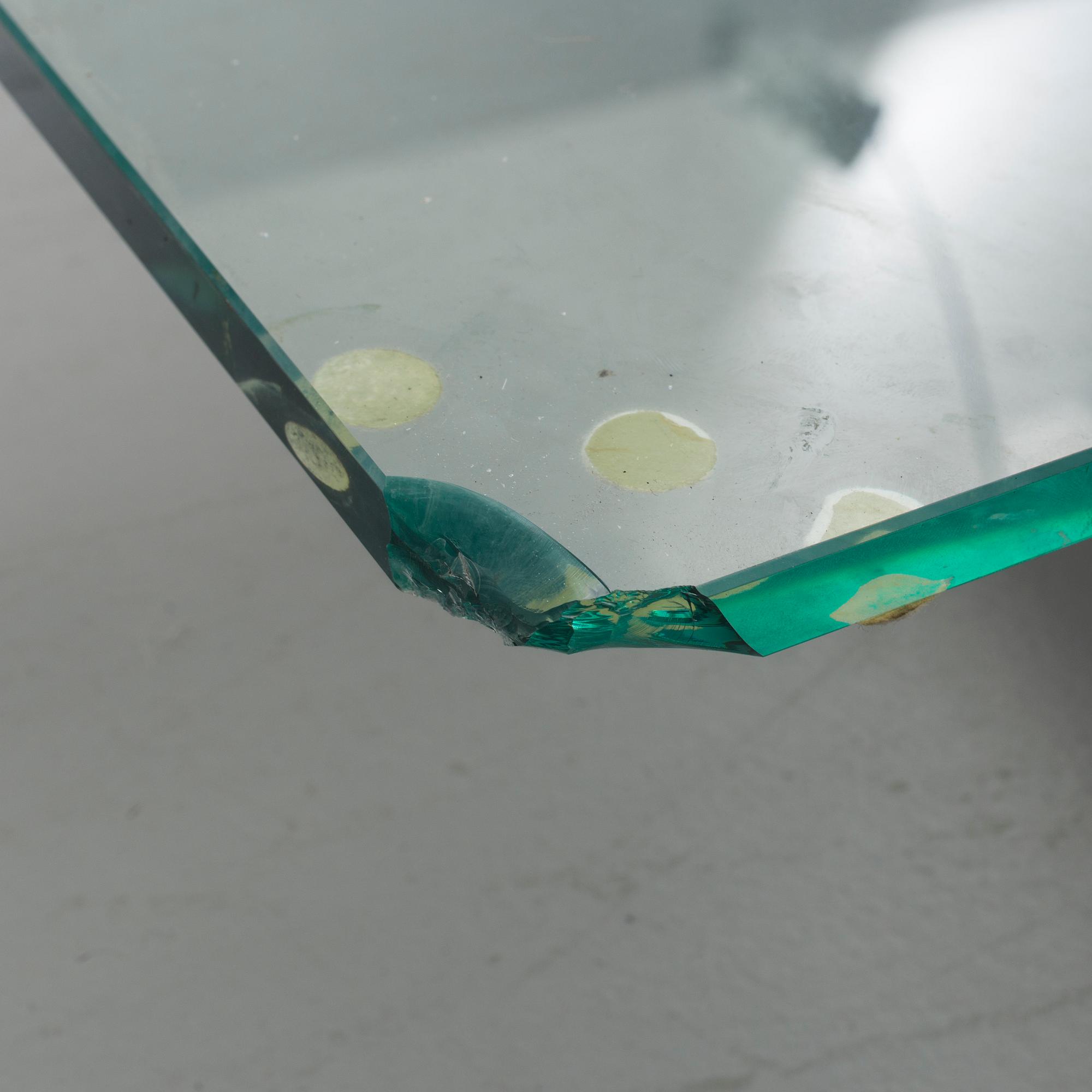 A PETER GHYCZY SIDE TABLE.