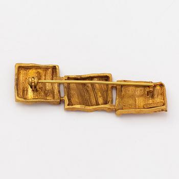 Kimmo Virkkunen, A 14K gold necklace, earrigns and brooch, diamonds ca. 0.06 ct in total. Helsinki 1991.