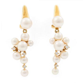 Earrings, a pair of 18K gold with cultured pearls and brilliant-cut diamonds.