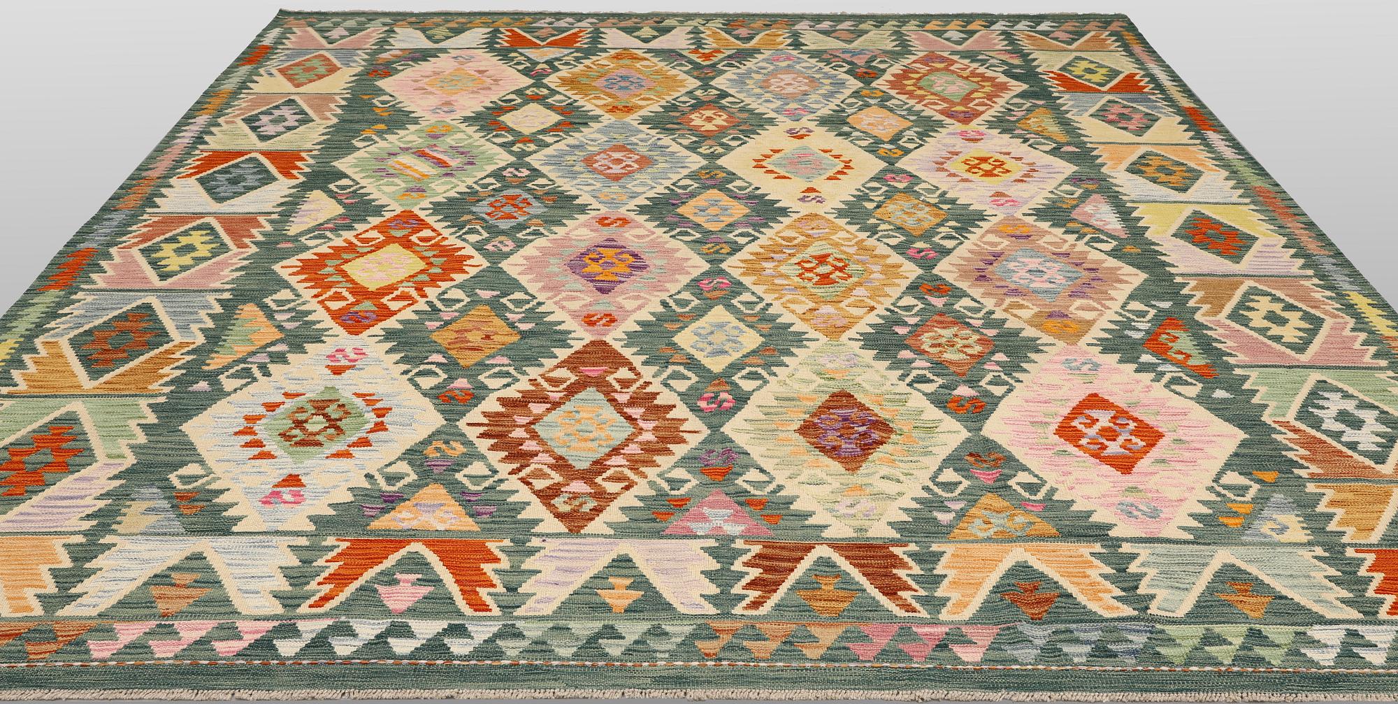 A Kelim carpet, 306 x 257 cm.