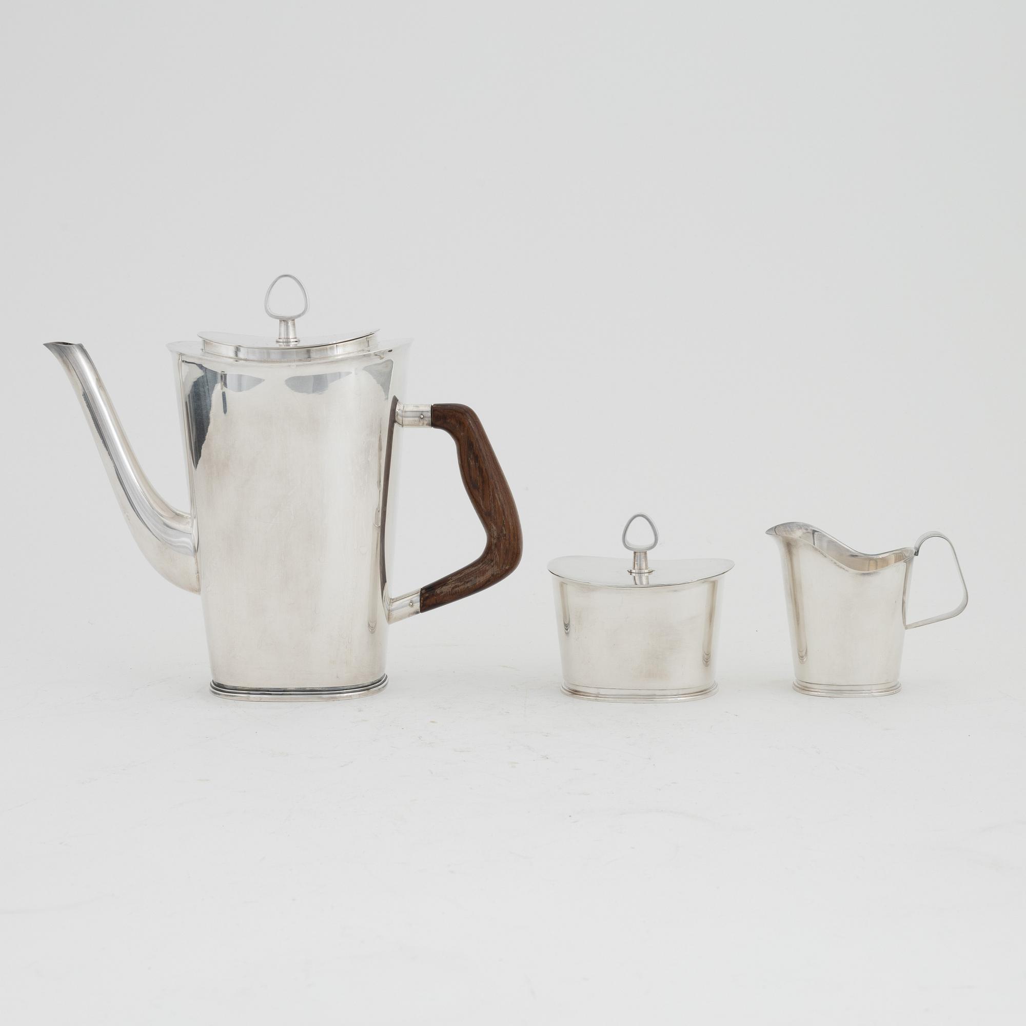 Vera Ferngren, a silver coffee pot, a lidded sugarbowl and a creamer, GAB, Stockholm, 1964-1965.