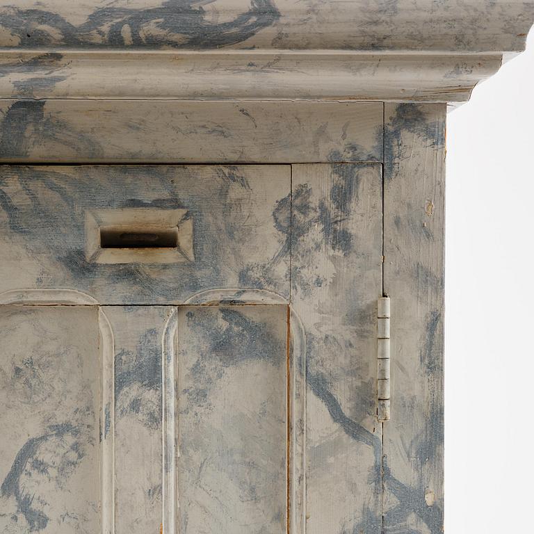 A Swedish column-shaped cabinet late 19 th century.