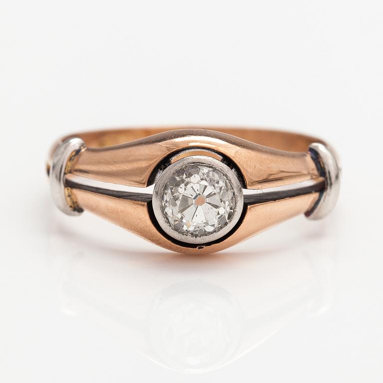 A 14K gold ring with a ca. 0.66 ct old-cut diamond.