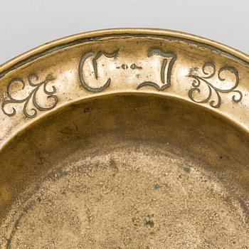 A 17th century bronze bowl.