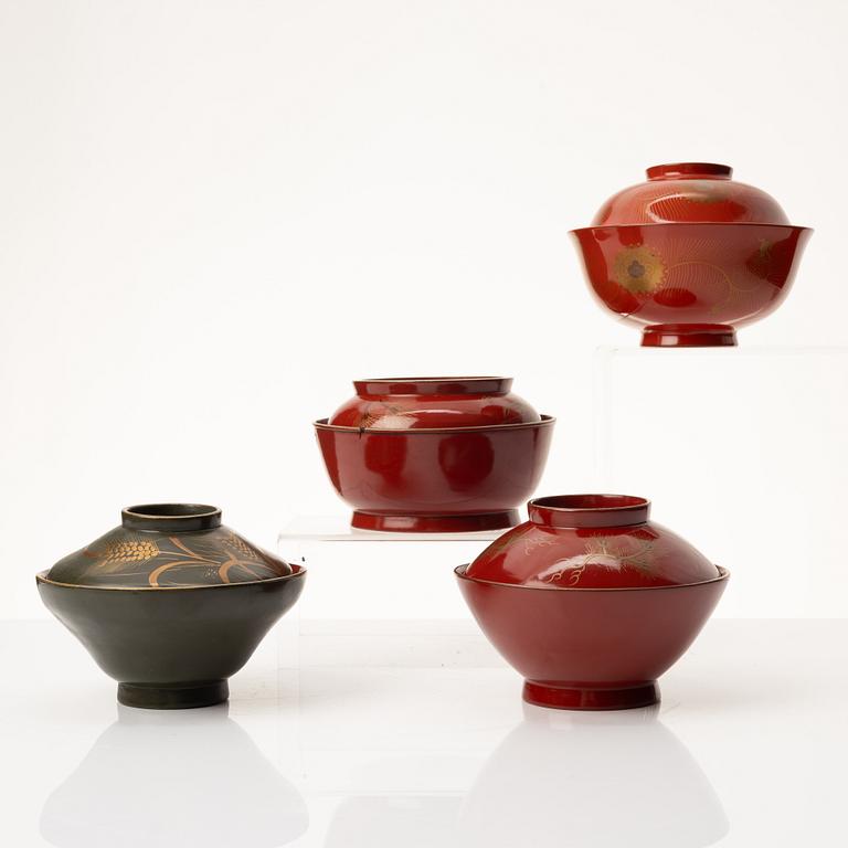 A group of nine Japanese lacquer bowls with covers, Meiji and 20th century.