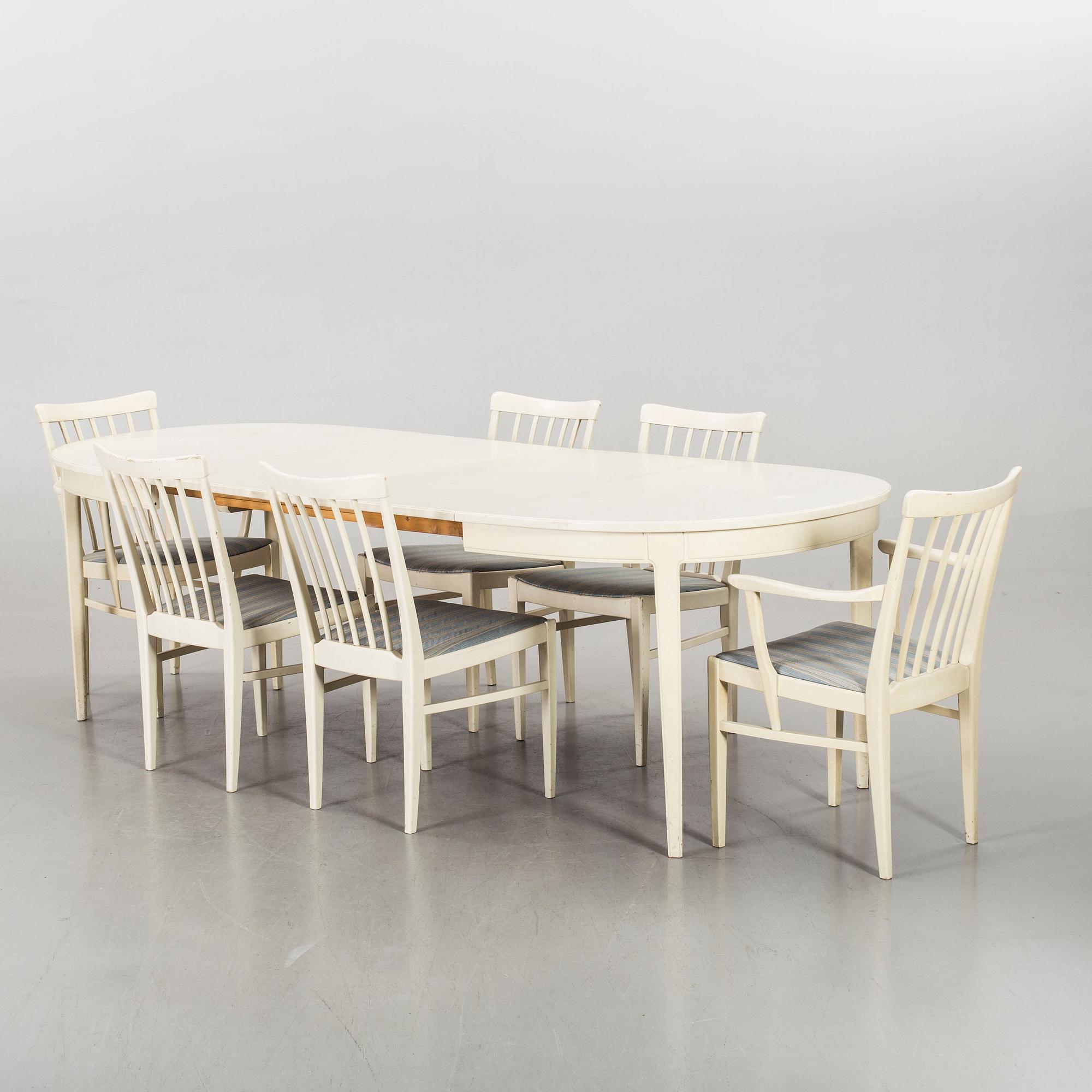 A dining group of 7 pieces by Carl Malmsten for Bodafors from the second half of the 20th century.