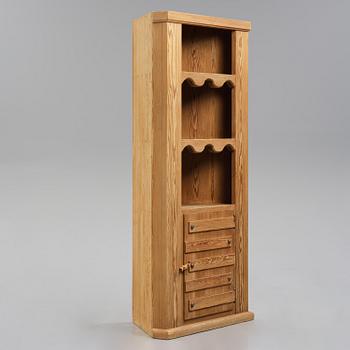 Axel Einar Hjorth, a stained pine "Sandhamn" corner cabinet, Nordiska Kompaniet, Sweden, 1931.